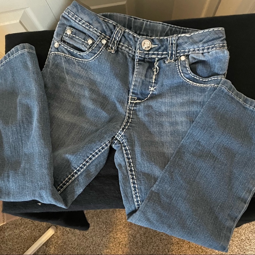 Light denim Cherokee jeans with crystal accents